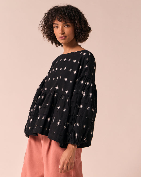 model wears simone ikat cotton top