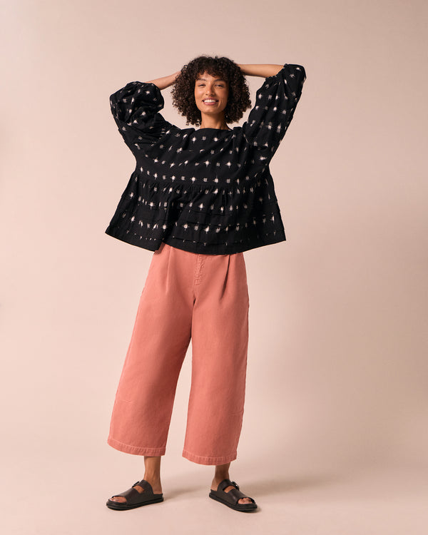 model wears simone ikat cotton top