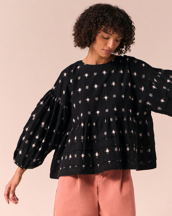 model wears simone ikat cotton top
