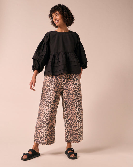 model wears simone black cotton smock top