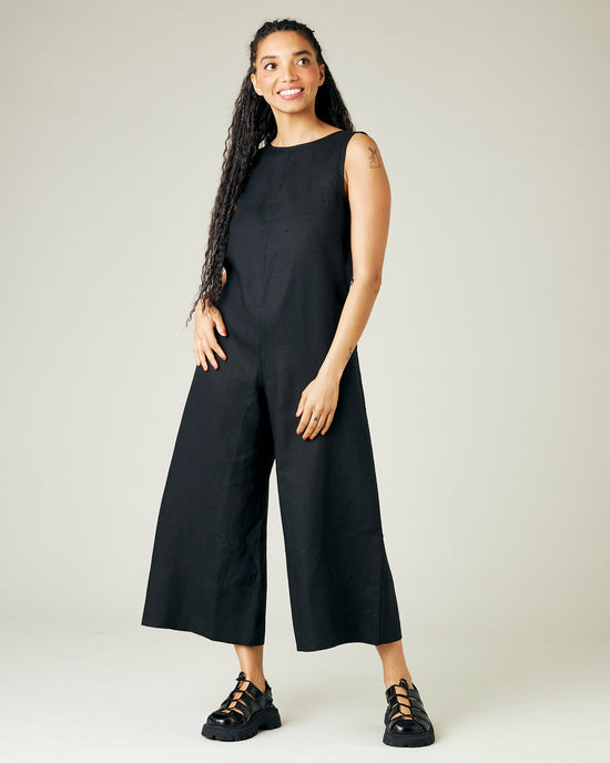 model wears black linen vivienne jumpsuit