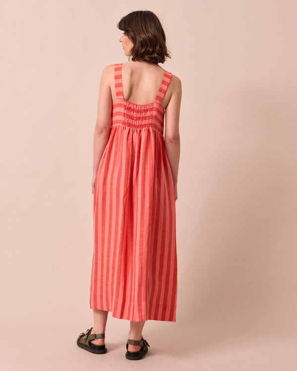 model wears suki sorbet stripe linen dress