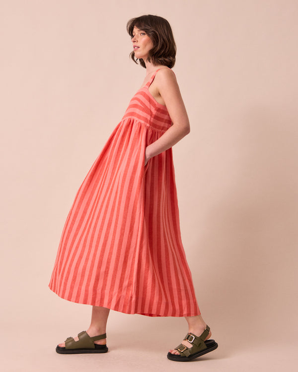model wears suki sorbet stripe linen dress
