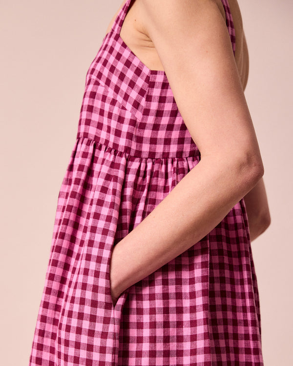model wears suki summer berry gingham linen dress