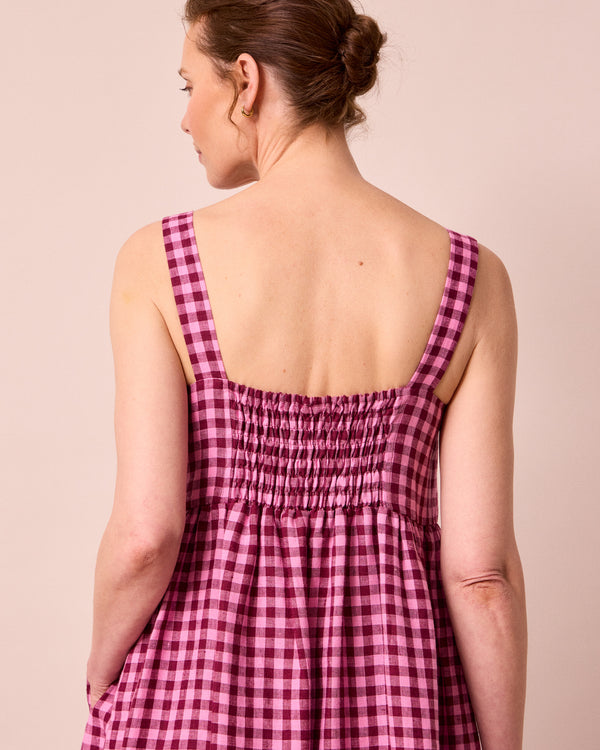model wears suki summer berry gingham linen dress