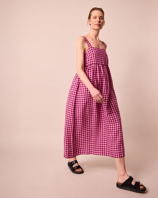 model wears suki summer berry gingham linen dress