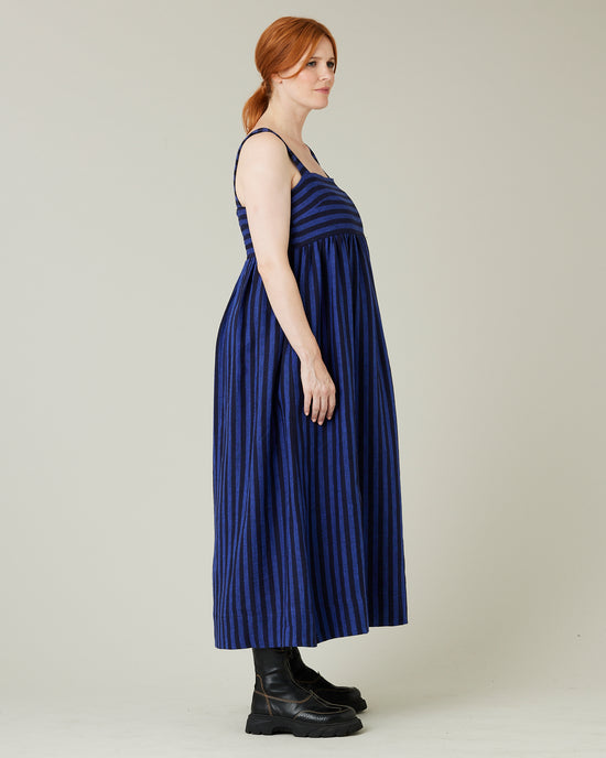 pregnant model wears indigo stripe linen suki dress