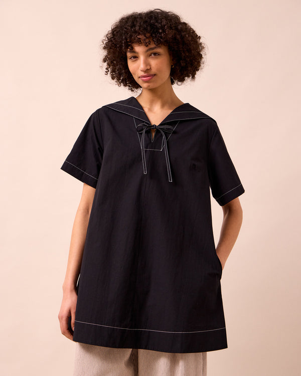 model wear sylvia black cotton dress