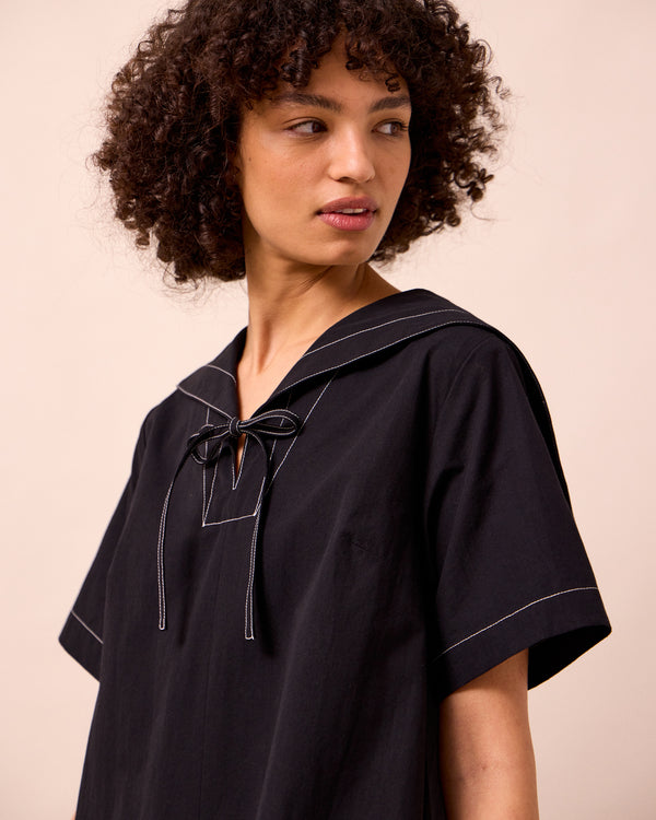 model wear sylvia black cotton dress