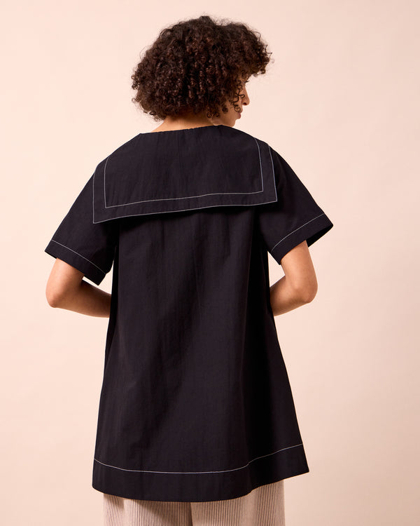 model wear sylvia black cotton dress