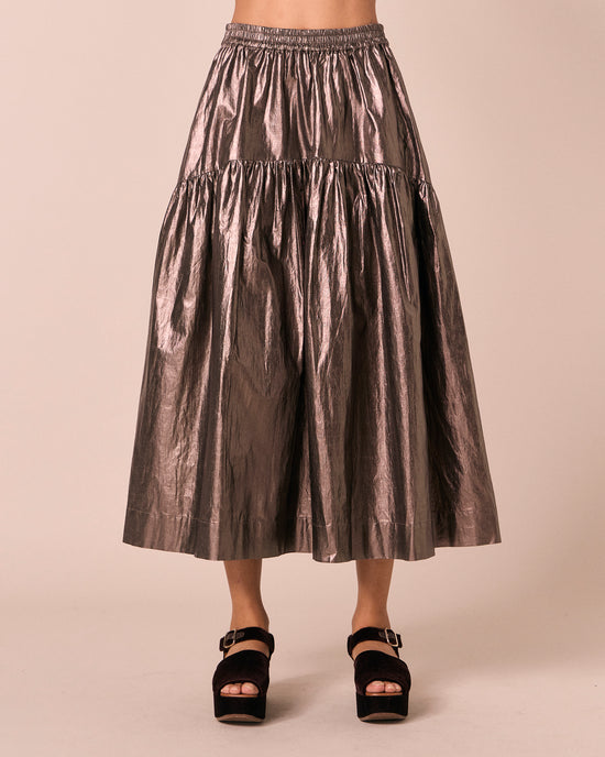 model wears alia pewter metallic linen skirt