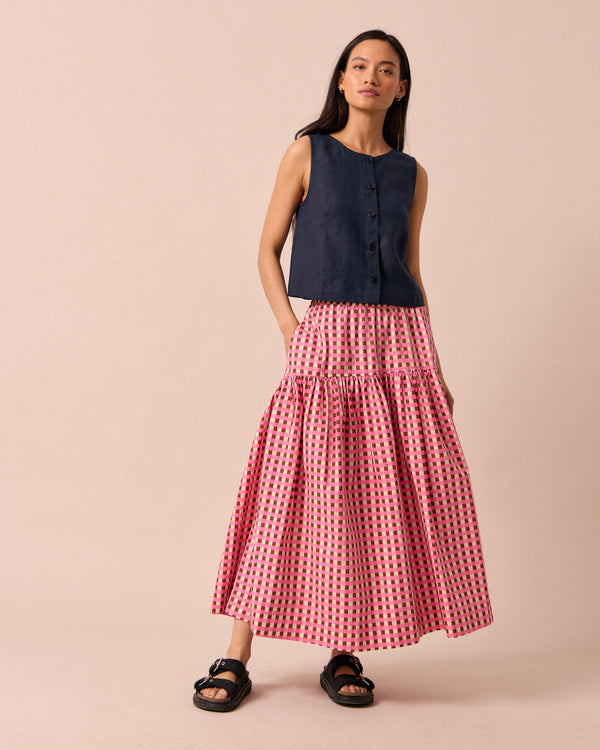 model wears talia neopolitan check textured cotton skirt