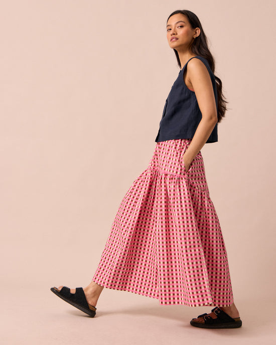 model wears talia neopolitan check textured cotton skirt