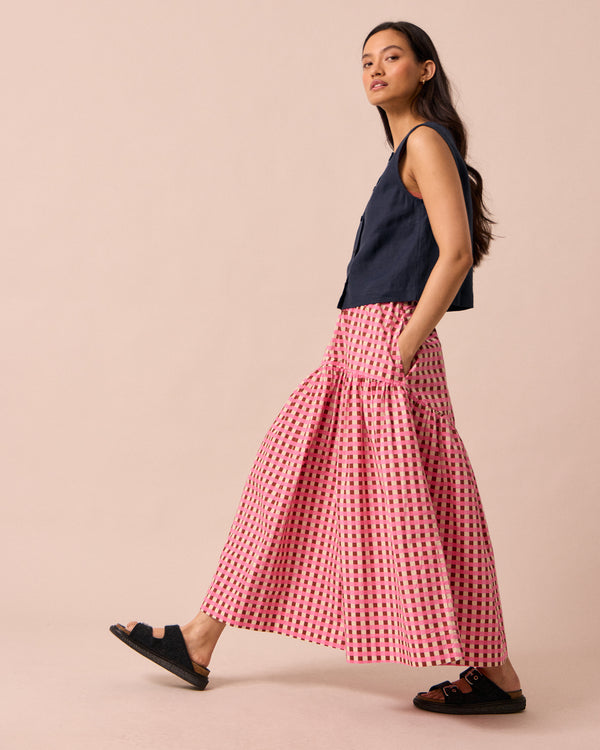 model wears talia neopolitan check textured cotton skirt