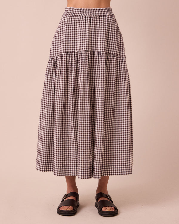 model wears talia ganache gingham cotton linen skirt