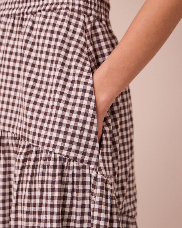 model wears talia ganache gingham cotton linen skirt