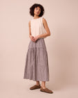 model wears talia ganache gingham cotton linen skirt