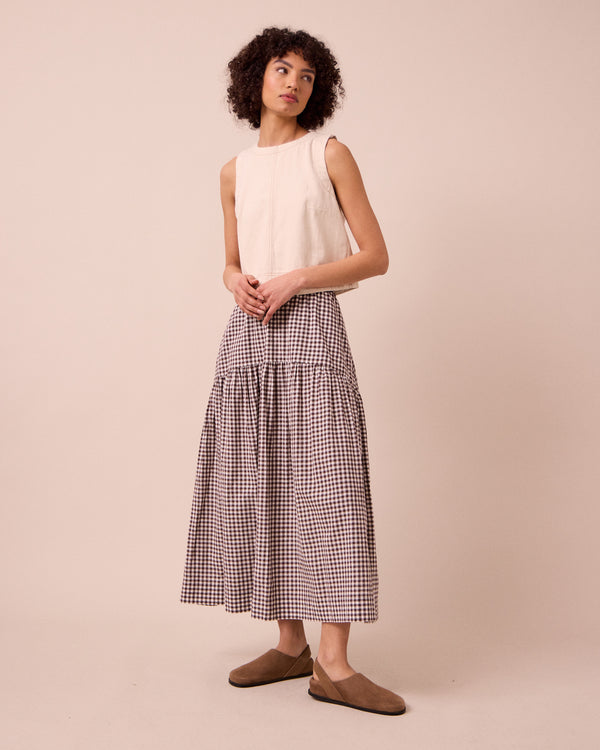 model wears talia ganache gingham cotton linen skirt