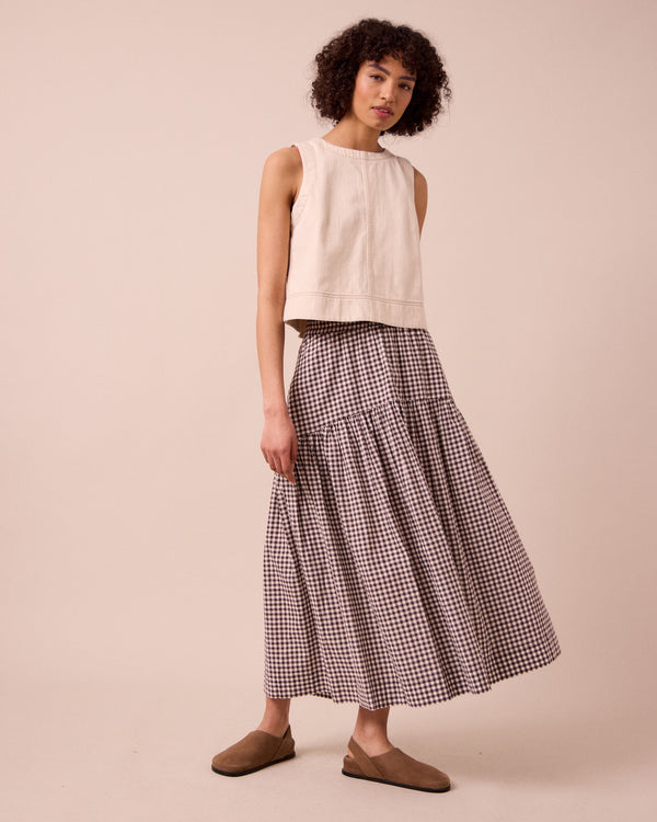model wears talia ganache gingham cotton linen skirt