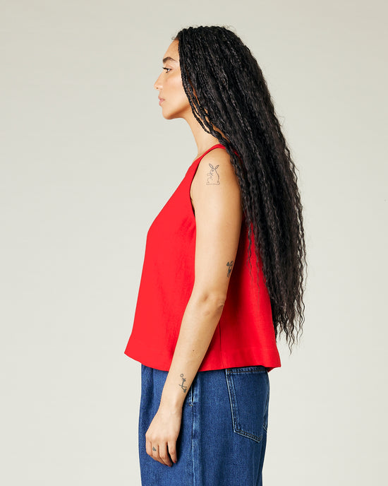 model wears red linen tara top