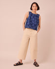 model wears tavi raffia denim jeans left