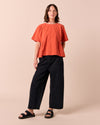 model wears tavi washed black denim jeans left