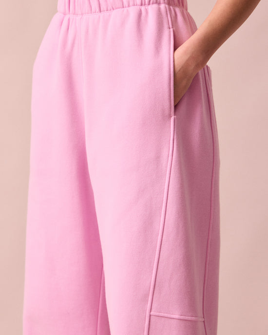 model wears tegan orchid pink fleeceback jersey trousers