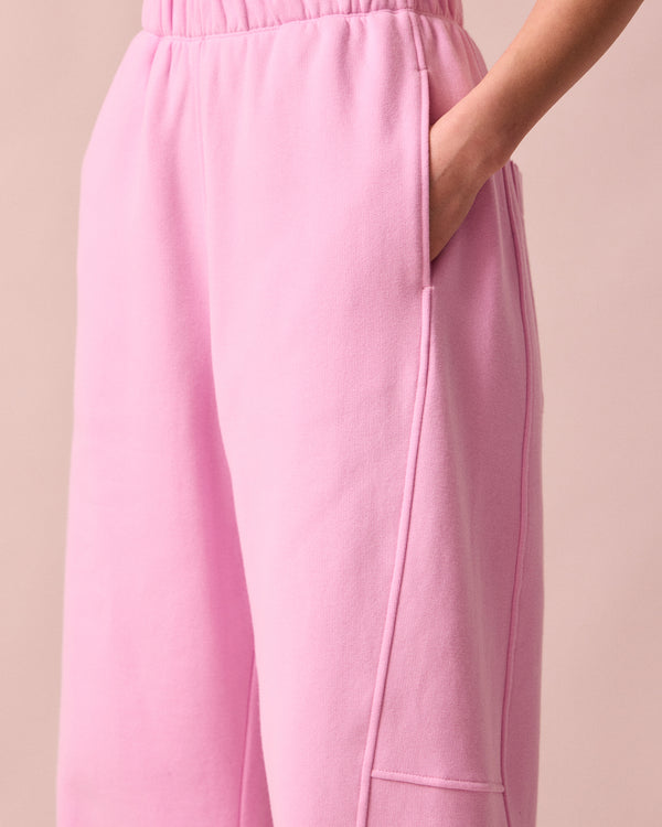 model wears tegan orchid pink fleeceback jersey trousers