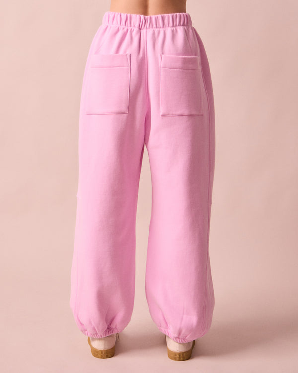 model wears tegan orchid pink fleeceback jersey trousers back