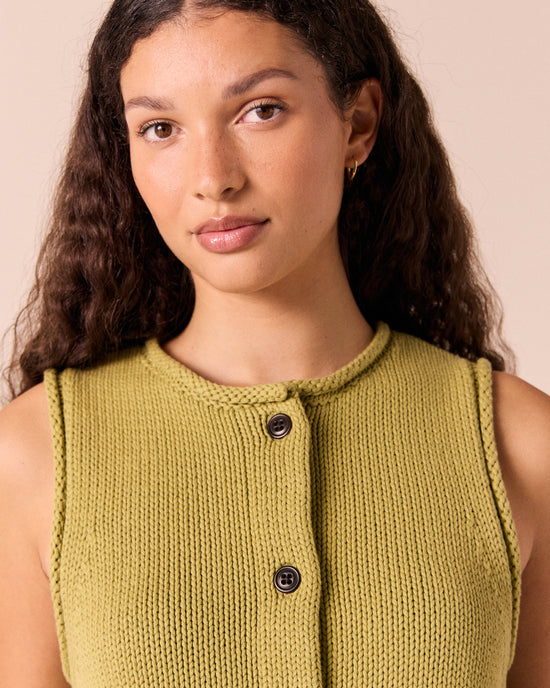 model wears tia gree knitted vest 