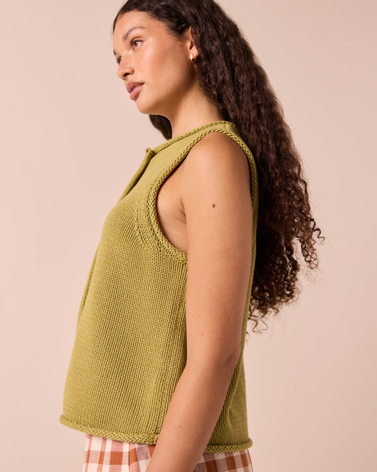 model wears tia gree knitted vest 