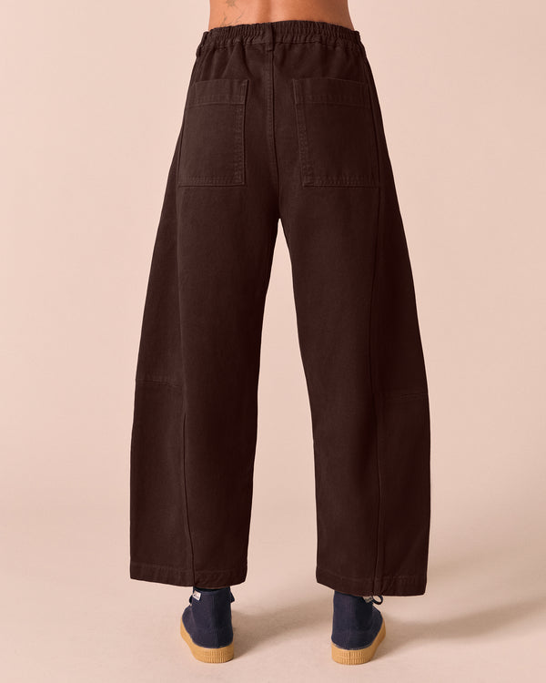 model wears tori cedar denim jeans back