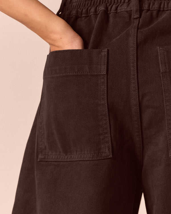 model wears tori cedar denim jeans