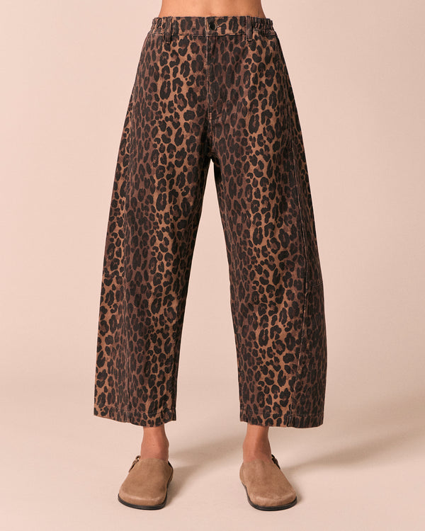 model wears tori dark leopard denim jeans front