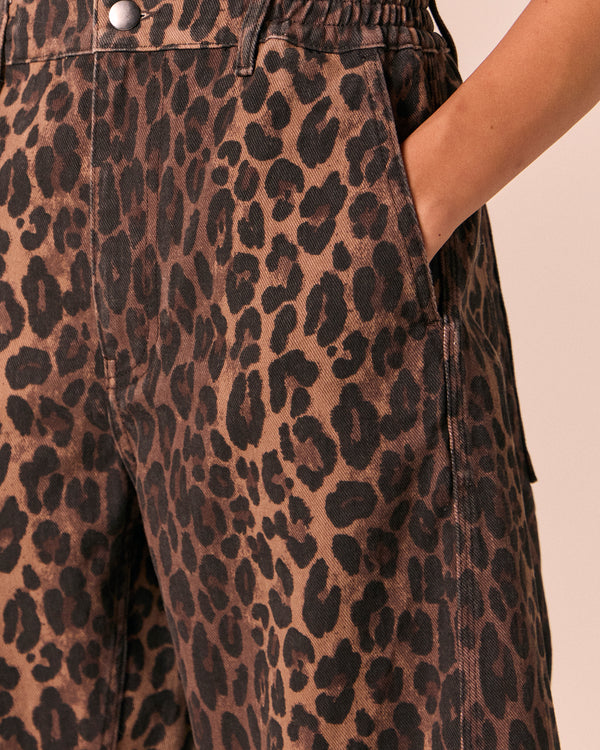 model wears tori dark leopard denim jeans 