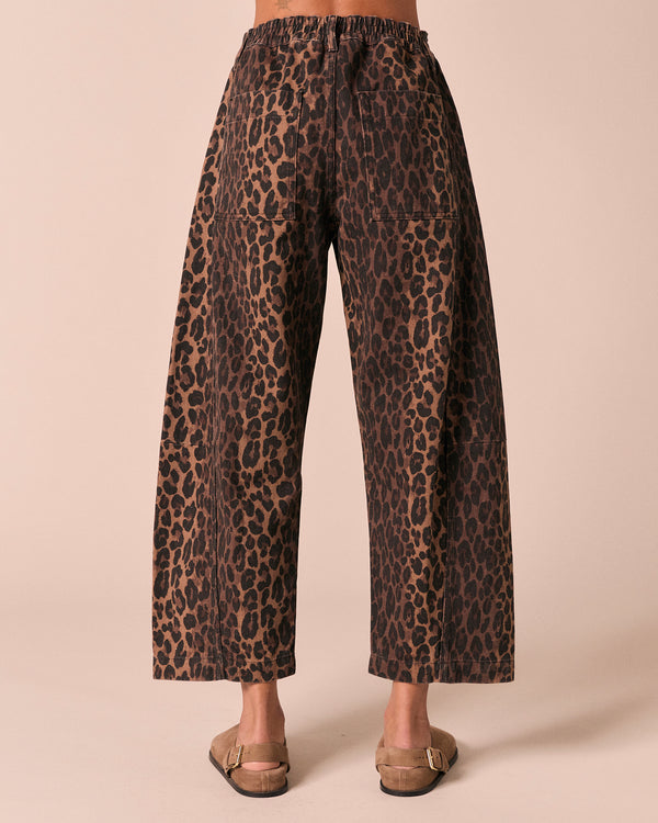 model wears tori dark leopard denim jeans back