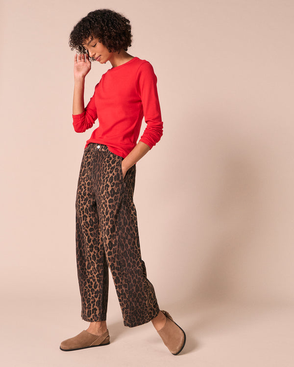 model wears tori dark leopard denim jeans right