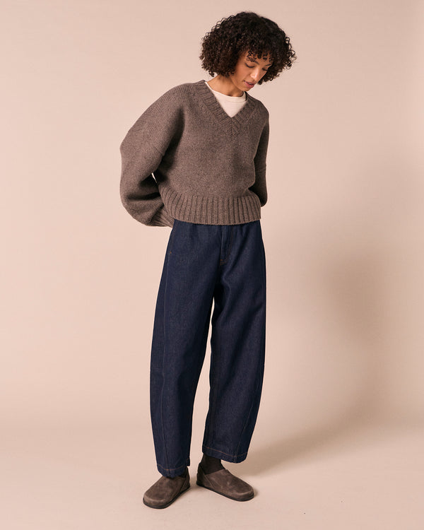 model wears tori indigo rinse denim jeans right