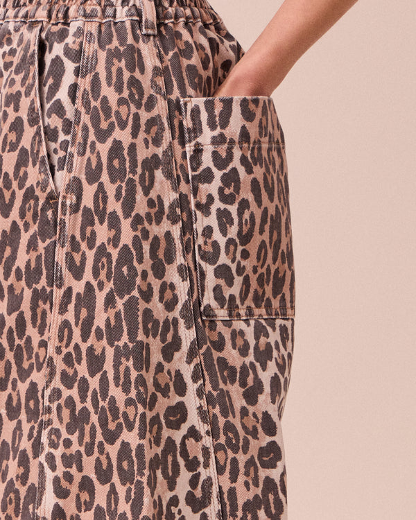 model wears tori leopard print denim jeans