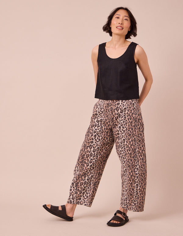 model wears tori leopard print denim jeans right
