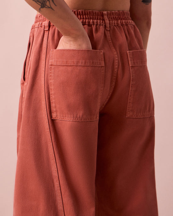 model wears tori clay pink denim jeans