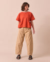 model wears tori sandstone denim jeans right