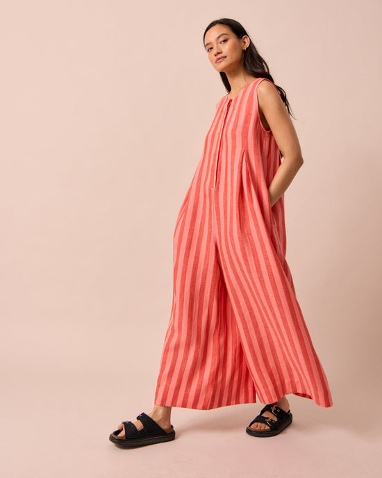model wears tula sorbet stripe linen jumpsuit