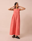 model wears tula sorbet stripe linen jumpsuit