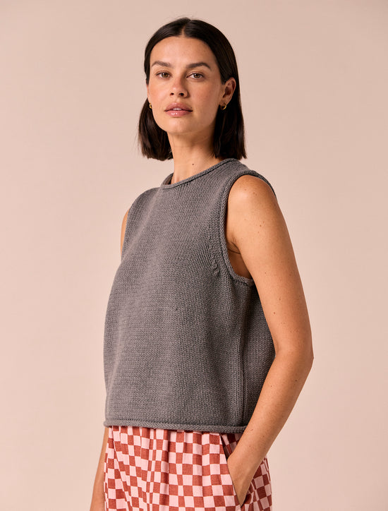 model wears tyler fog knitted vest