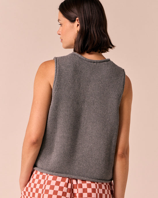 model wears tyler fog knitted vest