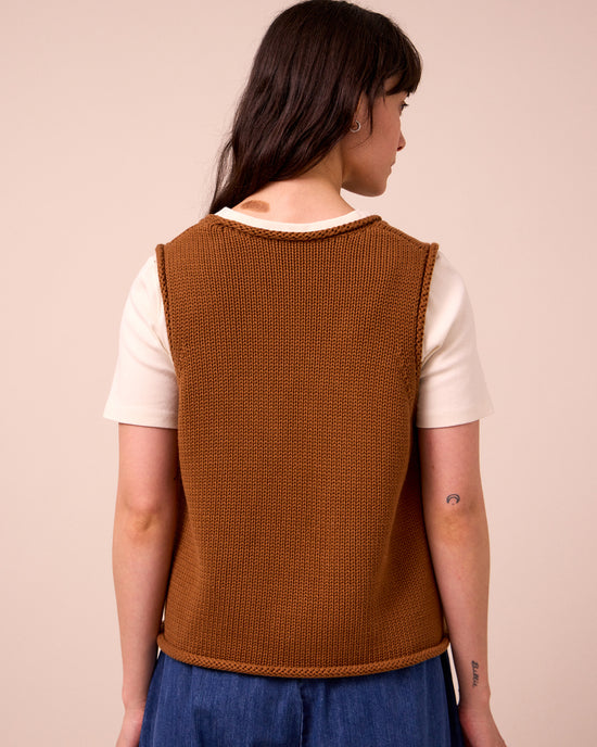model wears tyler tobacco knitted vest