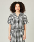 model wears black and white gingham linen pj top 