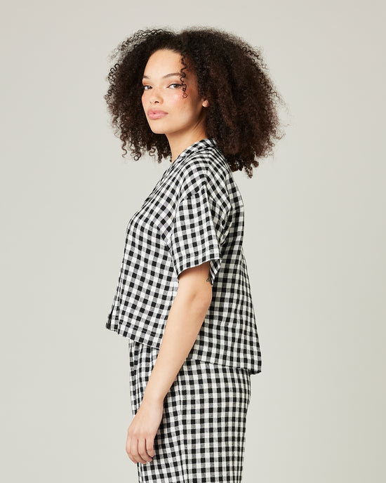 model wears black and white gingham linen pj top 