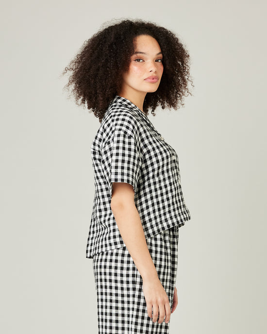 model wears black and white gingham linen pj top 